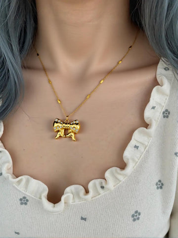 Golden Bow Pendant Necklace