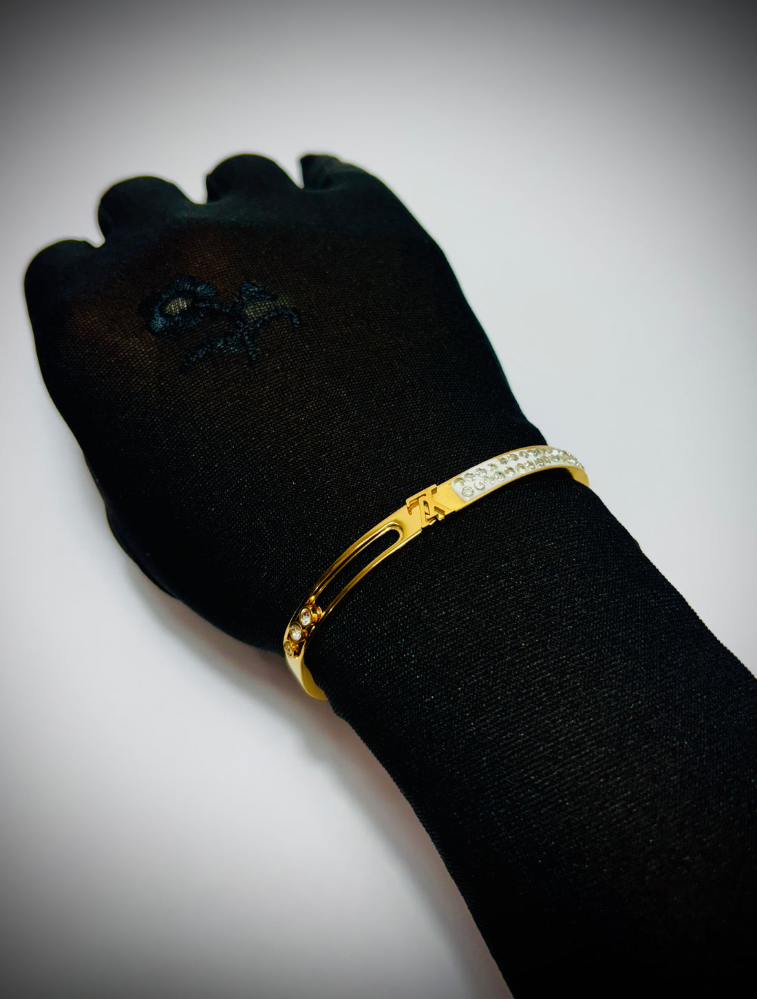 Stone-Studded Golden Bracelet with LV Brand Logo